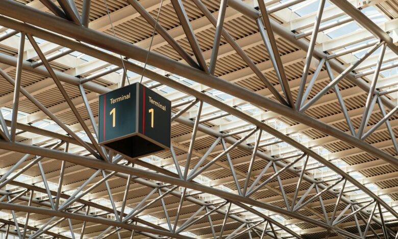 Modern airport terminal interior with comfortable seating and natural lighting