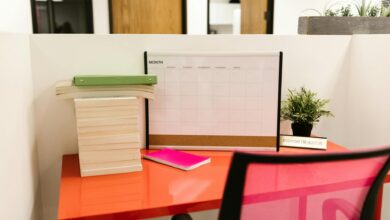 Clean, minimalist home office space with organized desk and shelving systems