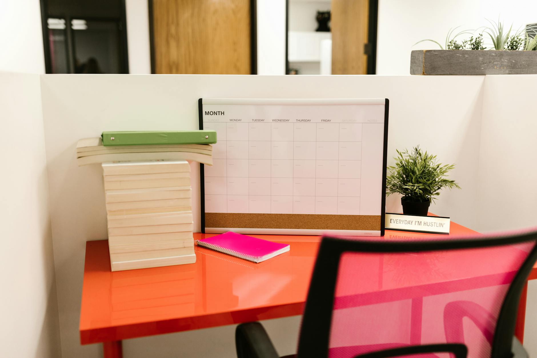 Clean, minimalist home office space with organized desk and shelving systems