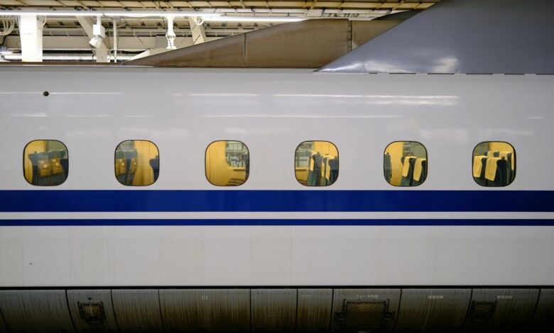 Modern bullet train at station platform showing sleek exterior design