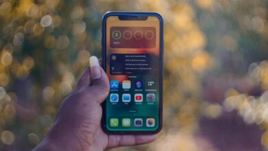 Person configuring smartphone hotspot settings on mobile device screen