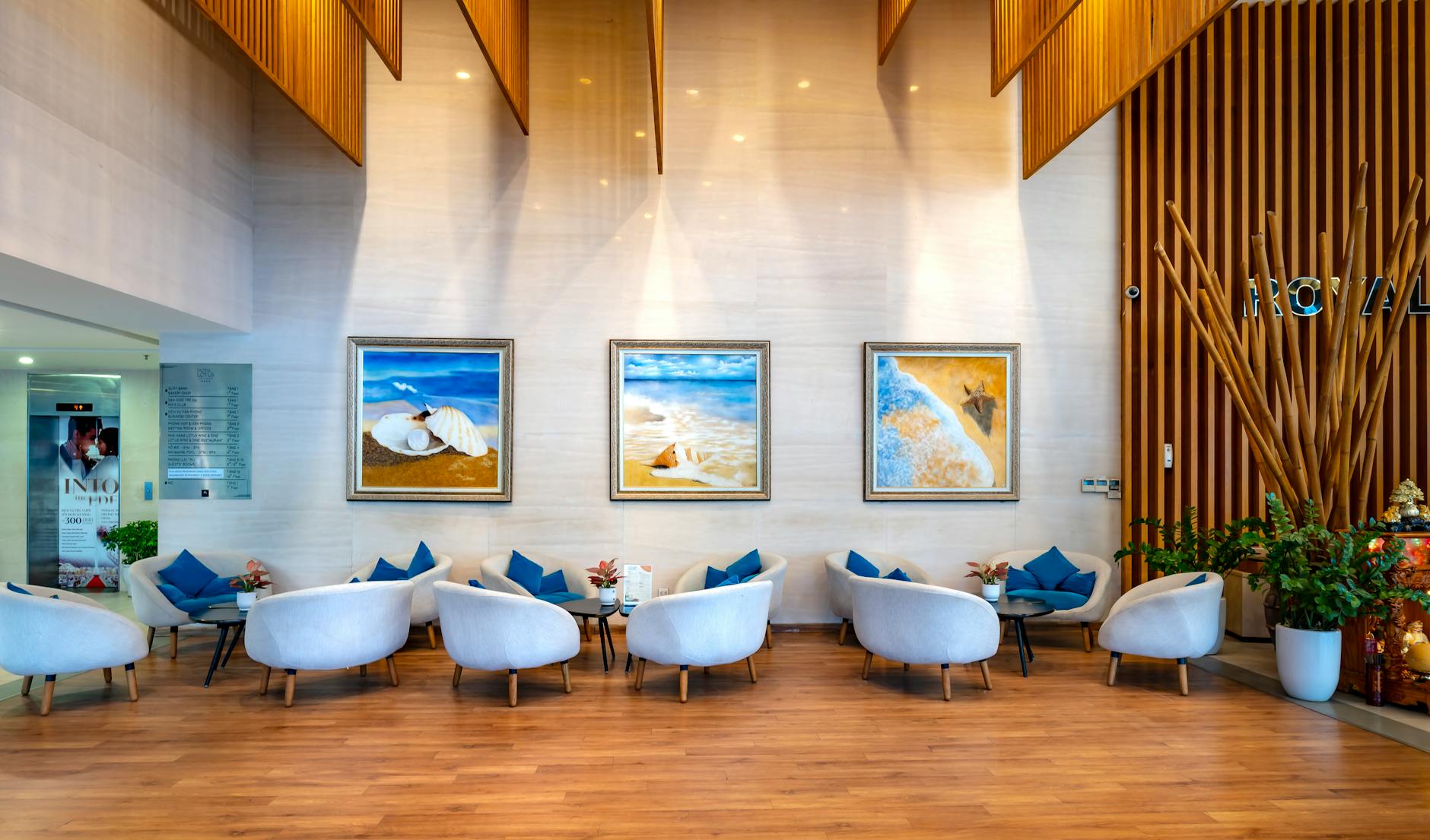 Modern luxury hotel lobby with contemporary design and business travelers