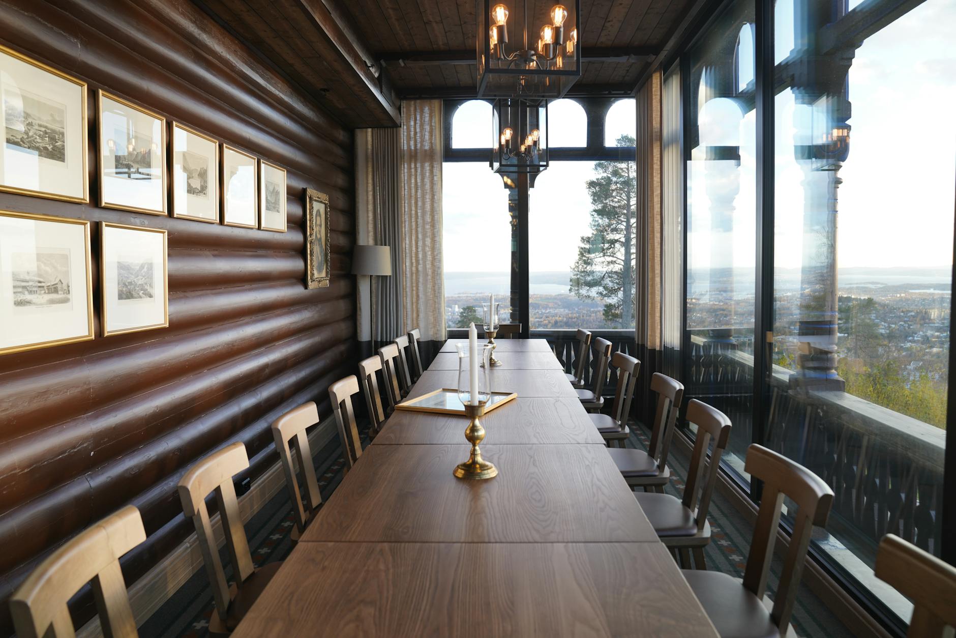 Cozy mountain tea house interior with traditional wooden furniture and warm lighting