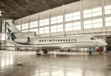 Interior of luxury private jet with comfortable seating and elegant design