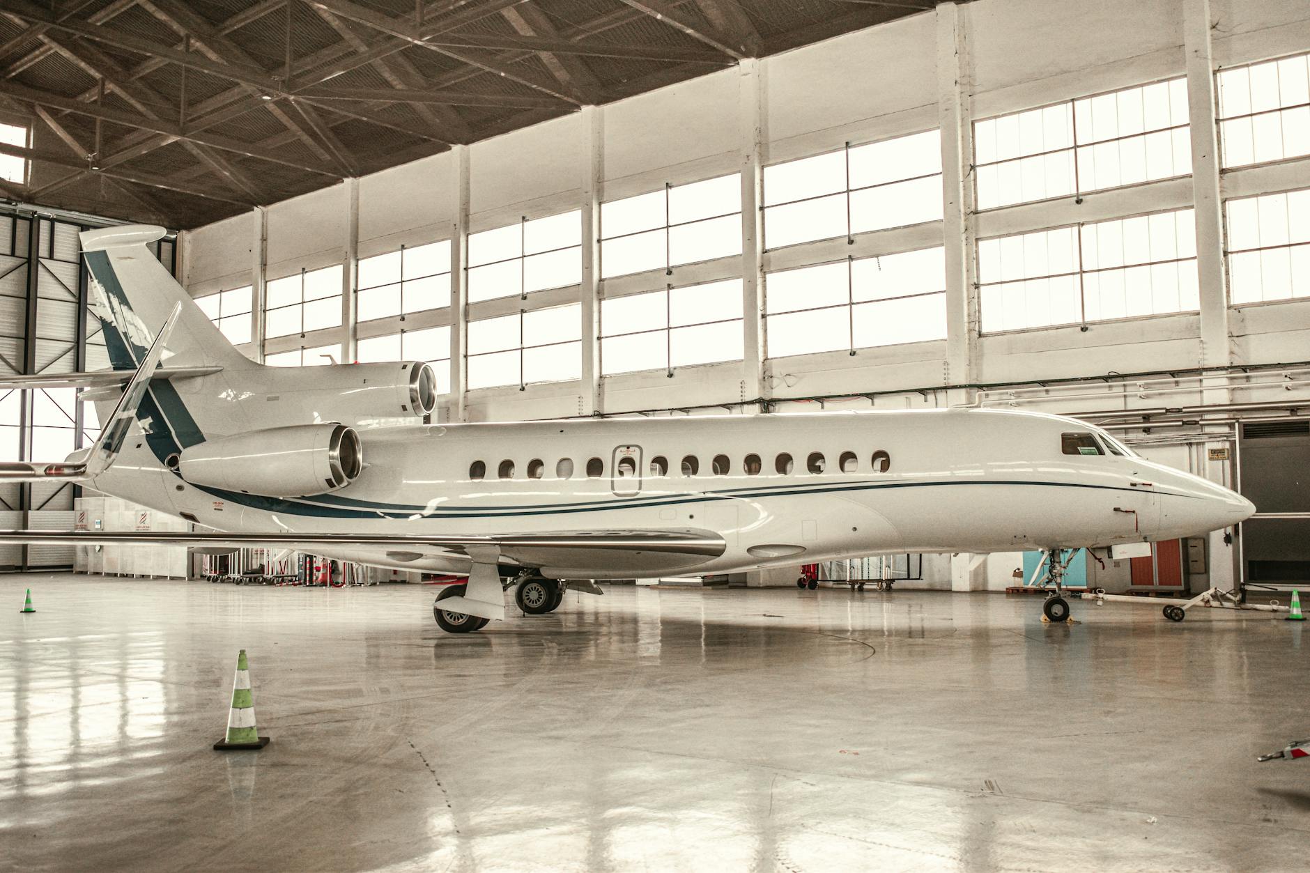 Interior of luxury private jet with comfortable seating and elegant design