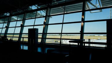 Modern airport lounge interior with comfortable seating and ambient lighting