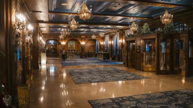 Elegant hotel lobby with marble floors and modern furniture showcasing upscale hospitality environment