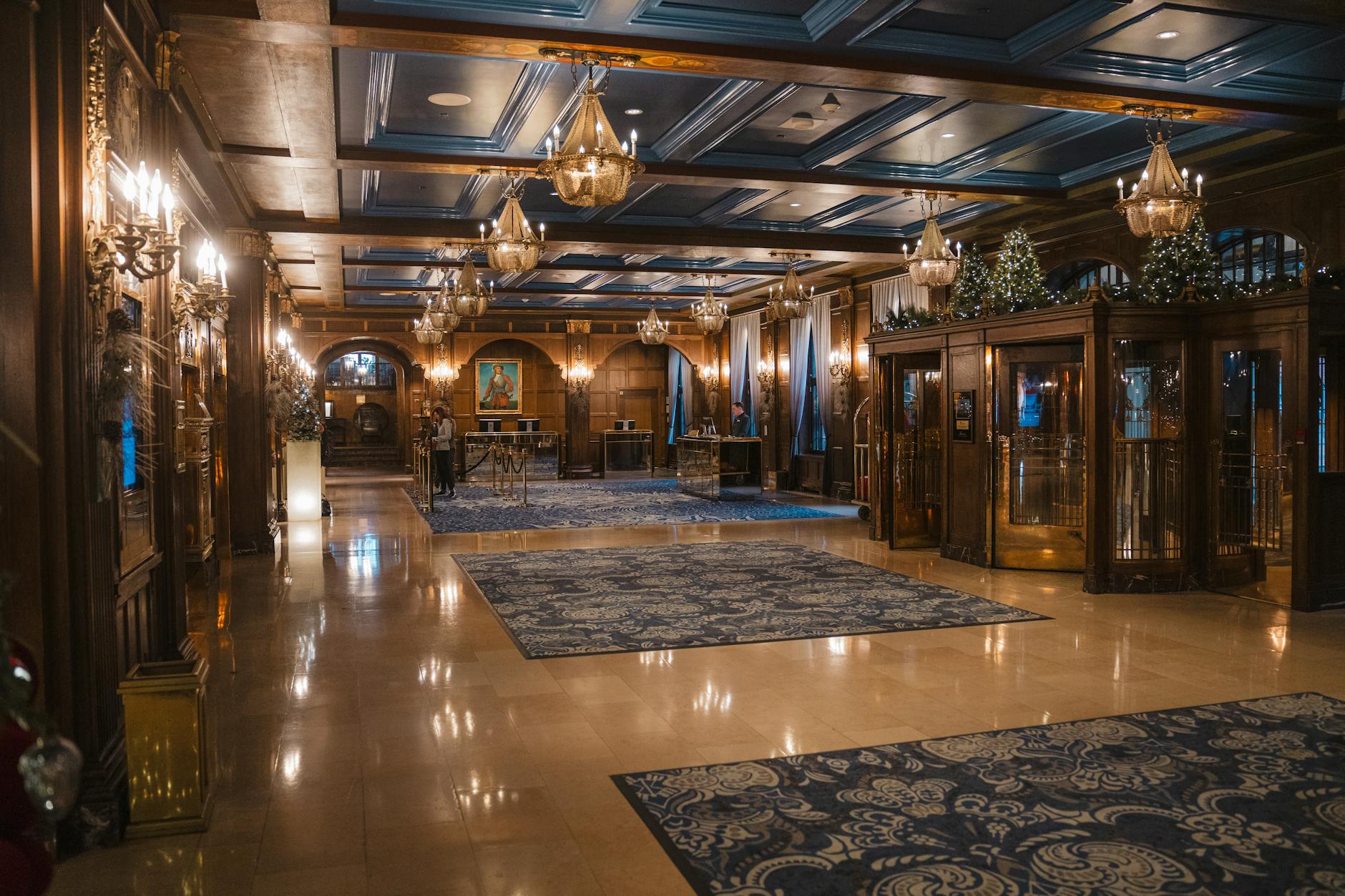Elegant hotel lobby with marble floors and modern furniture showcasing upscale hospitality environment