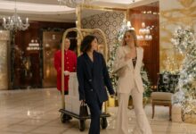 Modern hotel lobby with comfortable seating and reception desk