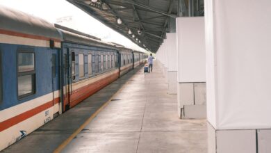 European train station platform with travelers waiting for departure