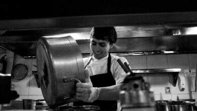 Professional chef preparing fresh ingredients in modern kitchen