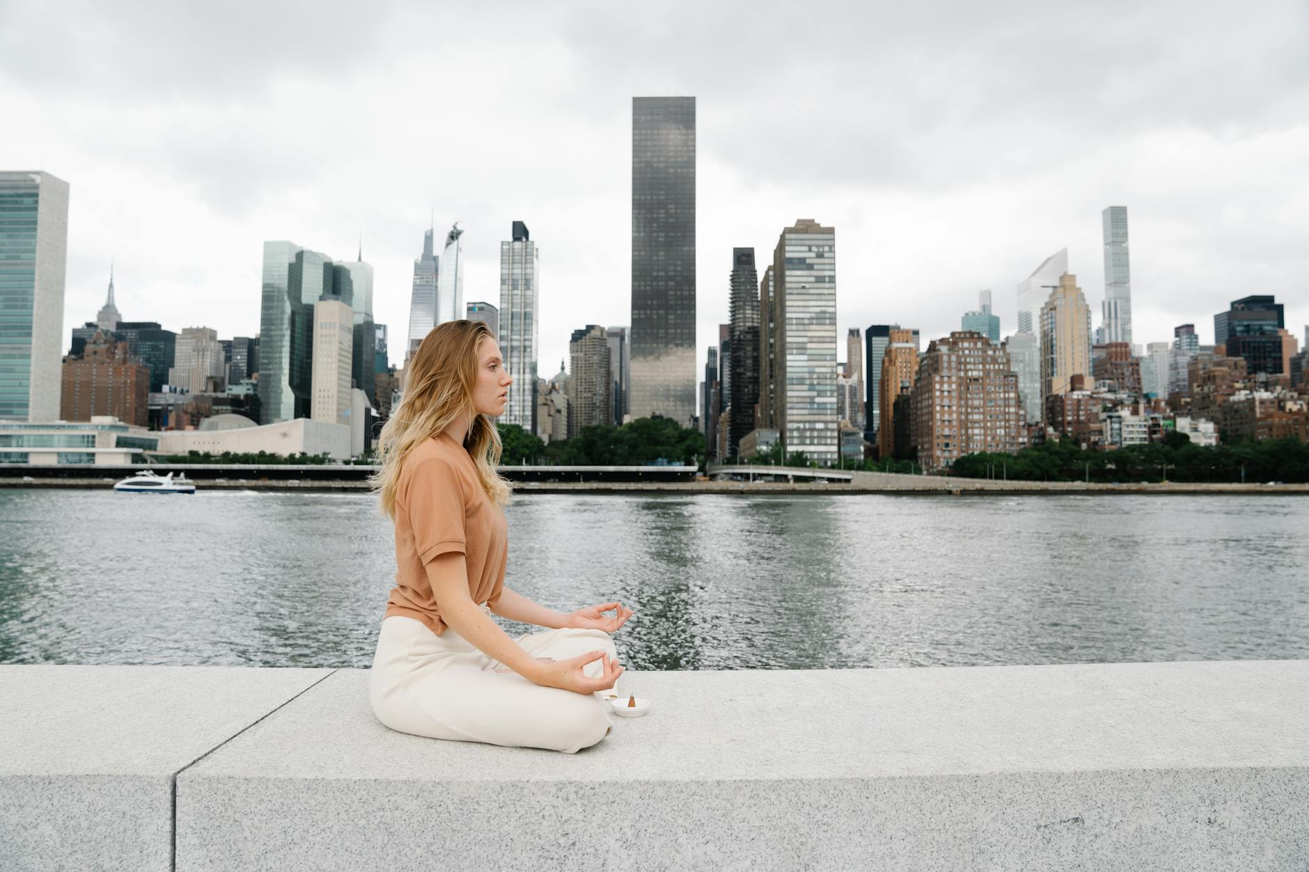 Professional person meditating in modern office environment