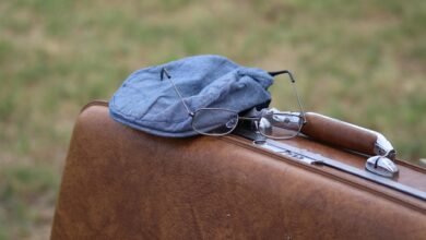 Travel-sized toiletries and electronic accessories arranged for efficient packing