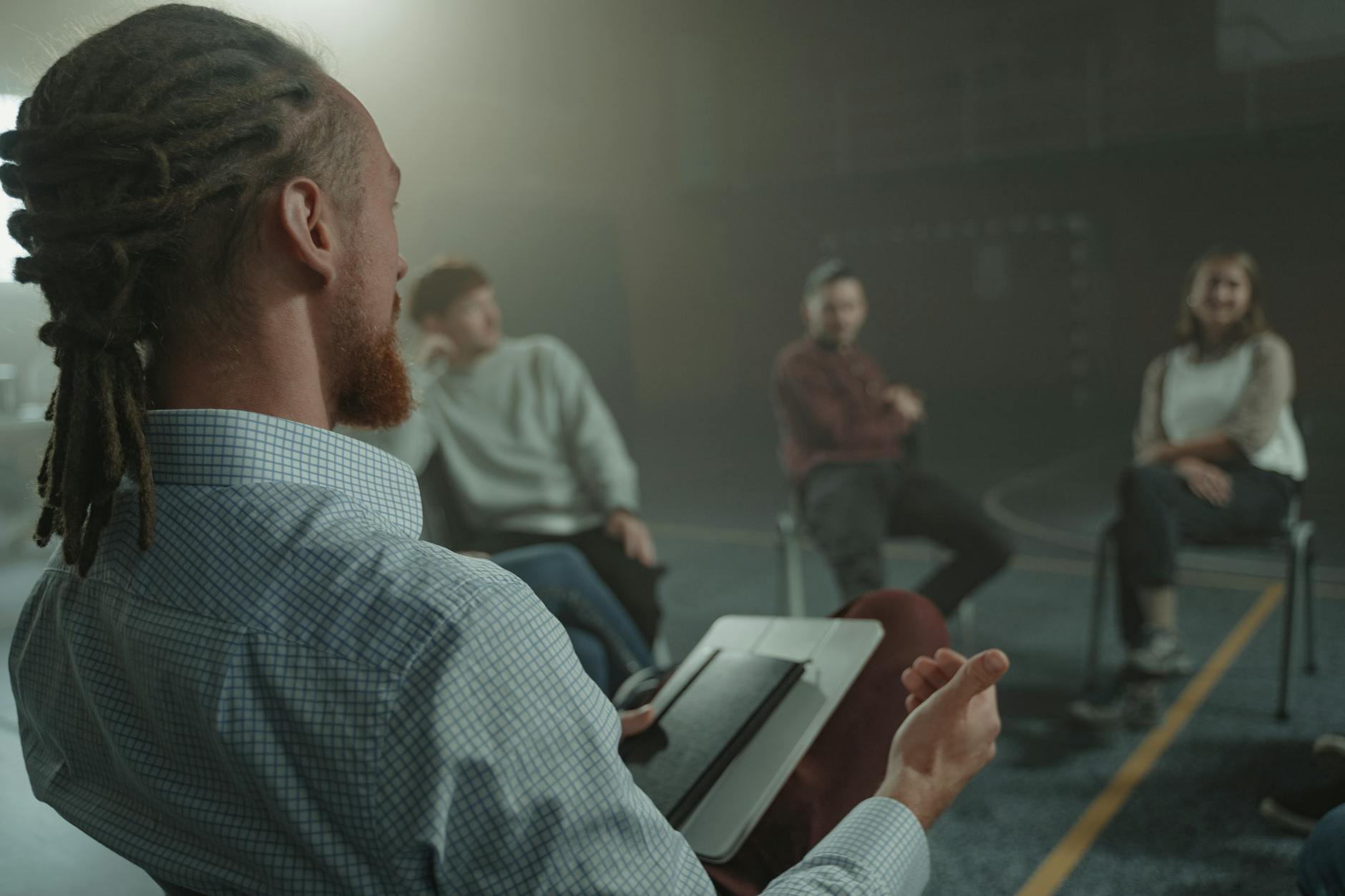 International group of people having conversation with mobile devices