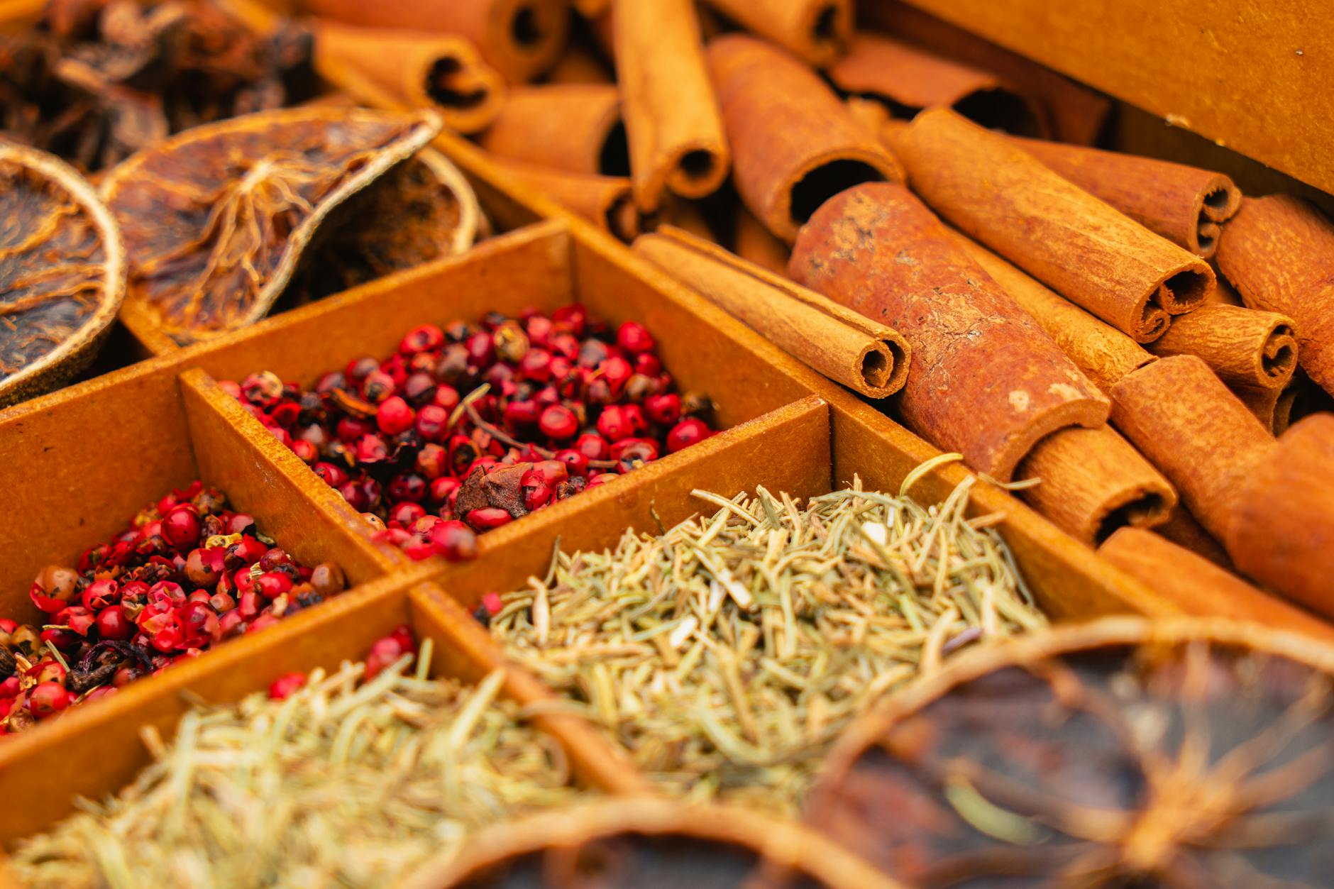 Colorful array of traditional Indian spices and ingredients laid out for cooking preparation