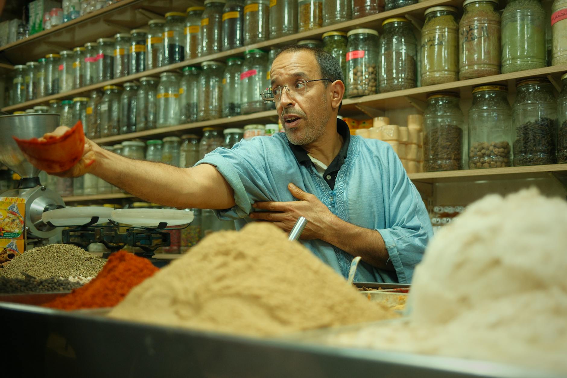 Colorful array of traditional Moroccan spices and herbs used in Berber cooking