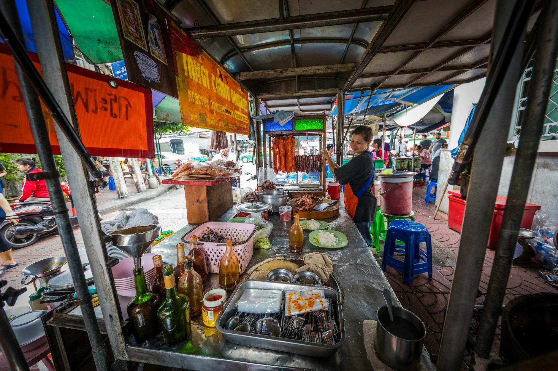 Busy local food market with vendors and customers representing authentic community dining culture