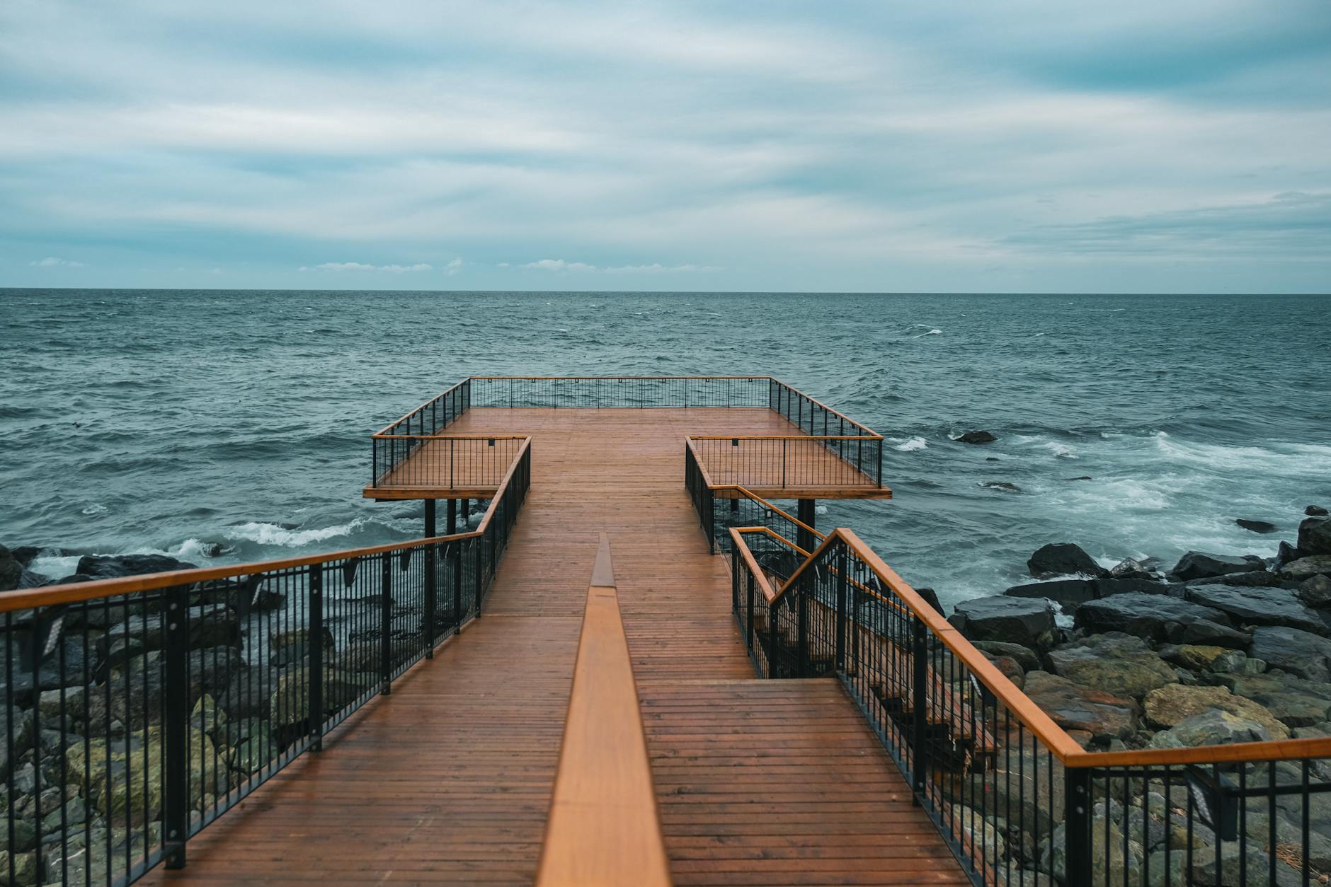 Elevated wooden viewing platform overlooking natural landscape