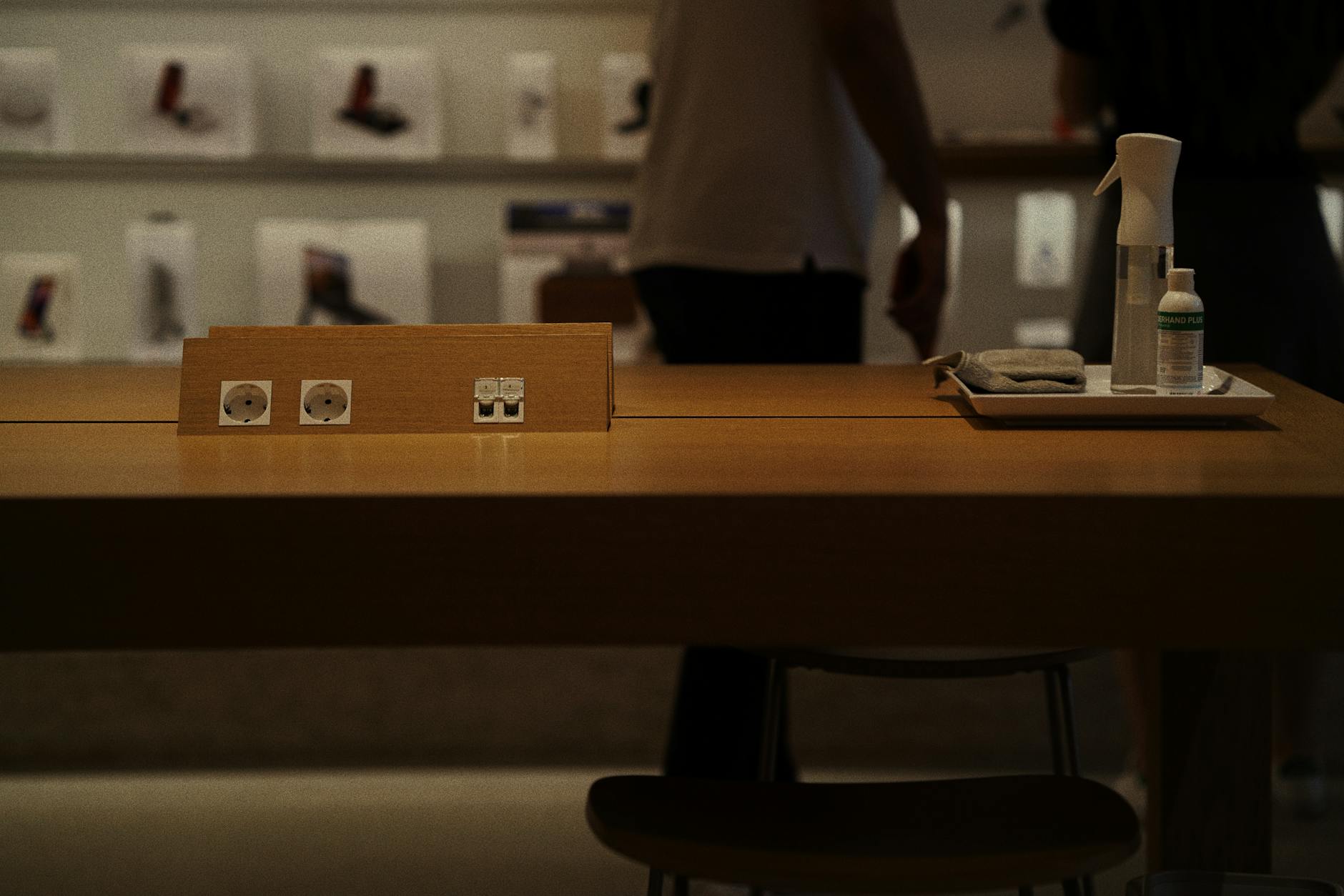 Organized wooden charging station with multiple device compartments in home entryway