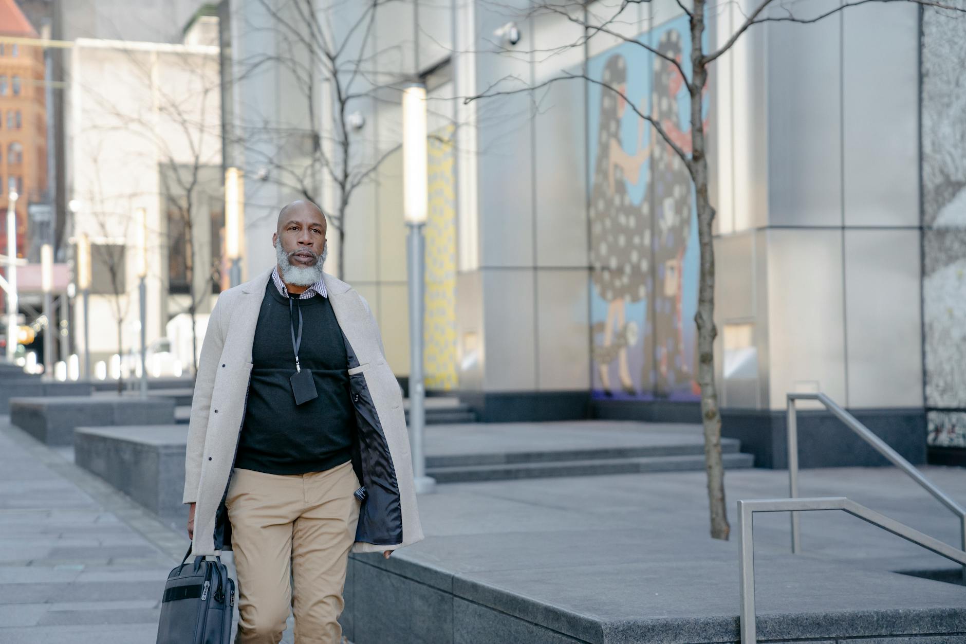 Business professional walking alone outdoors during thinking break for strategic solitude