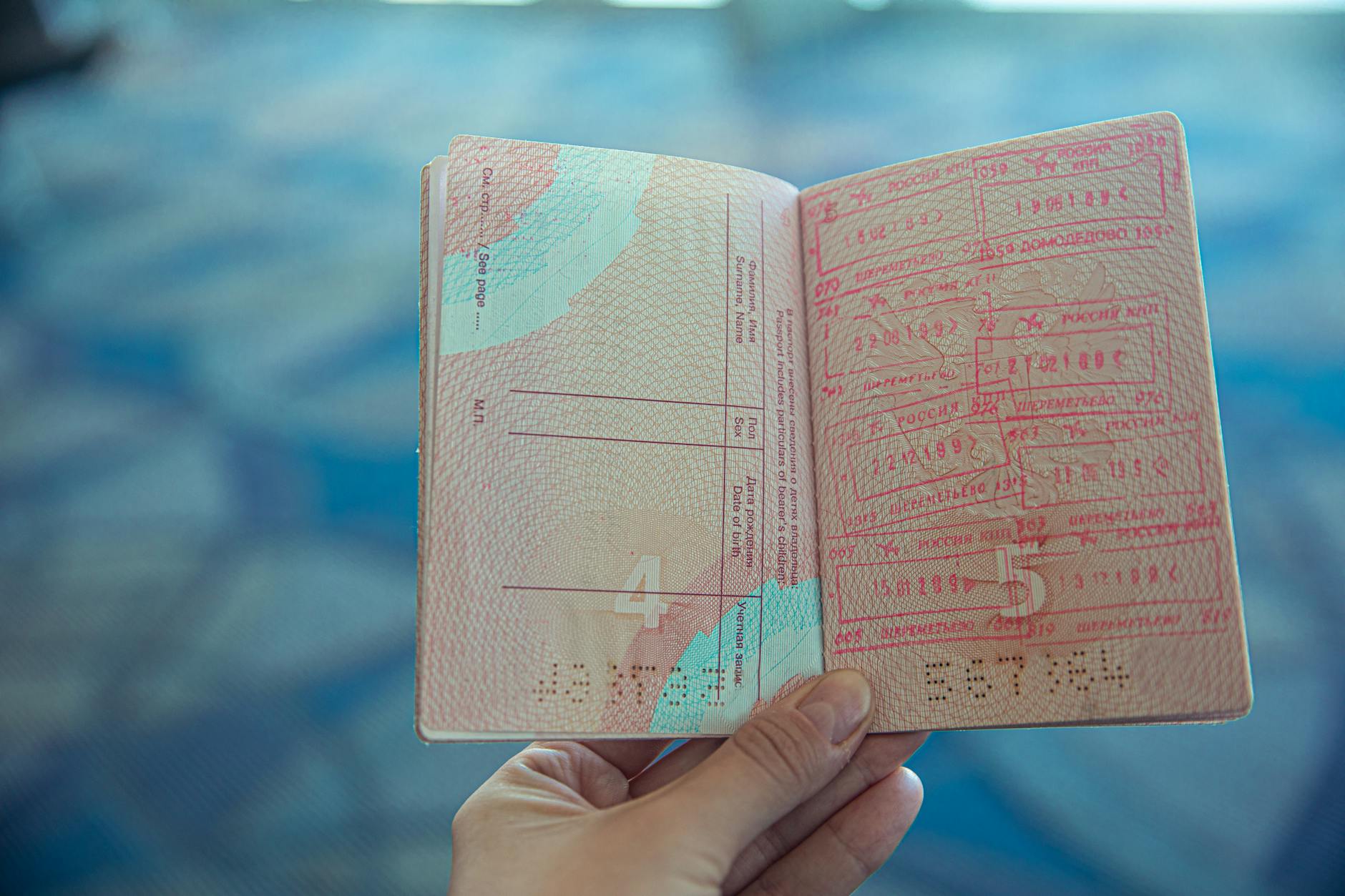 Passport with multiple visa stamps illustrating international travel documentation