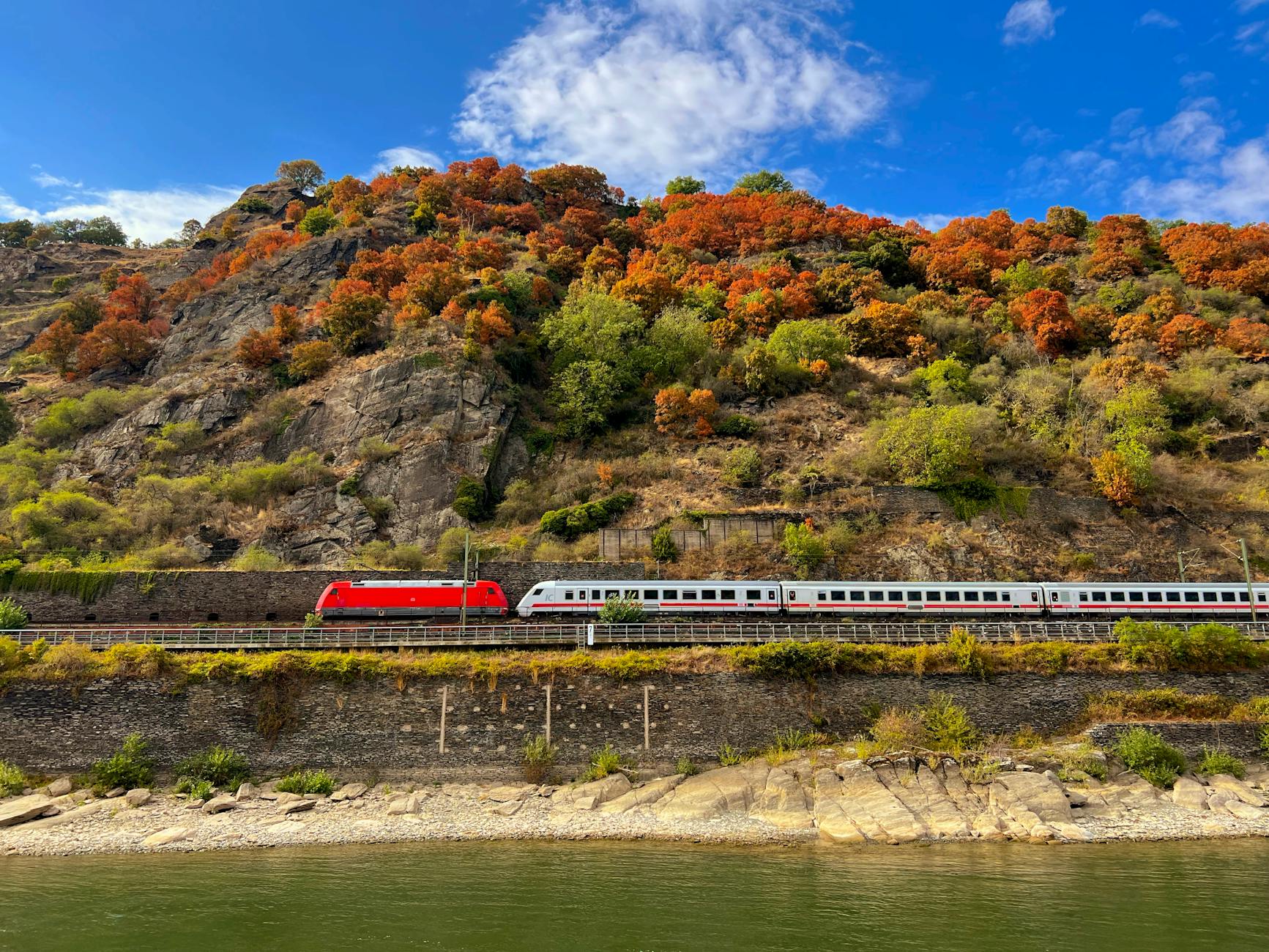 High-speed train traveling through scenic European countryside
