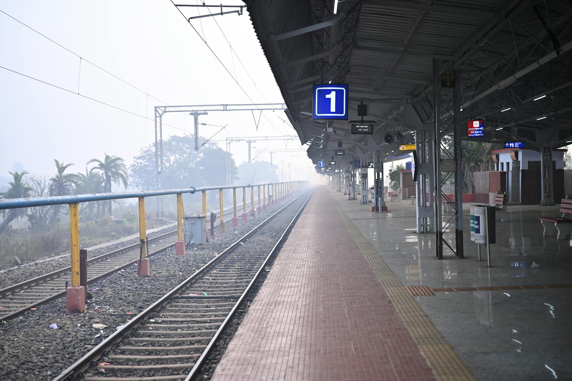 Modern railway station platform with waiting area designed for cold weather conditions