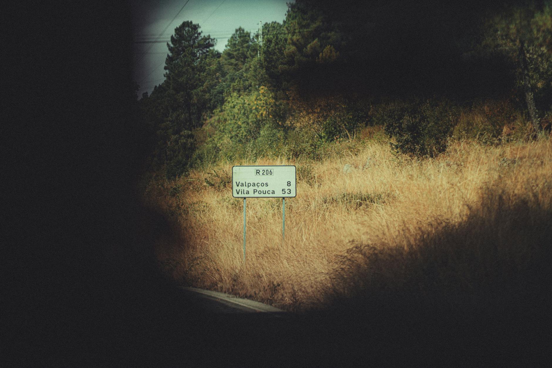 Rolling hills and countryside landscape in rural Portugal with scattered stone buildings