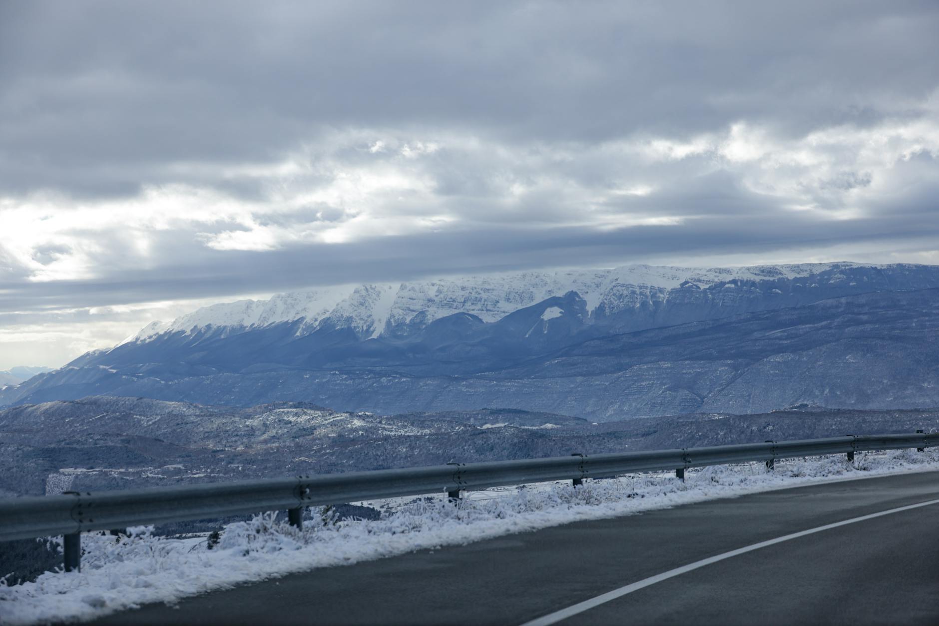 Snow-covered mountain landscape typical of Arctic regions where Indigenous communities teach traditional winter survival skills