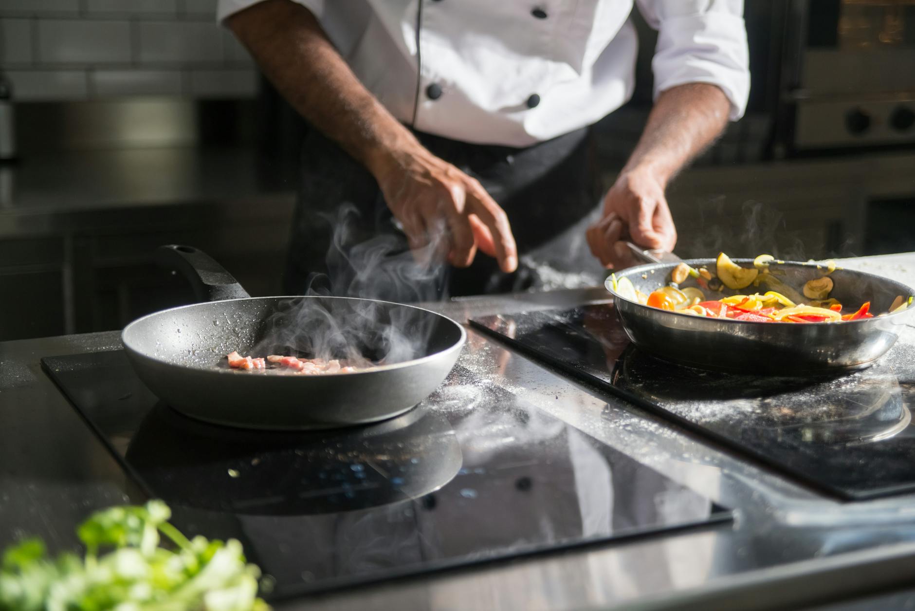 Chef preparing fresh food in open kitchen showing authentic local cooking methods and ingredients