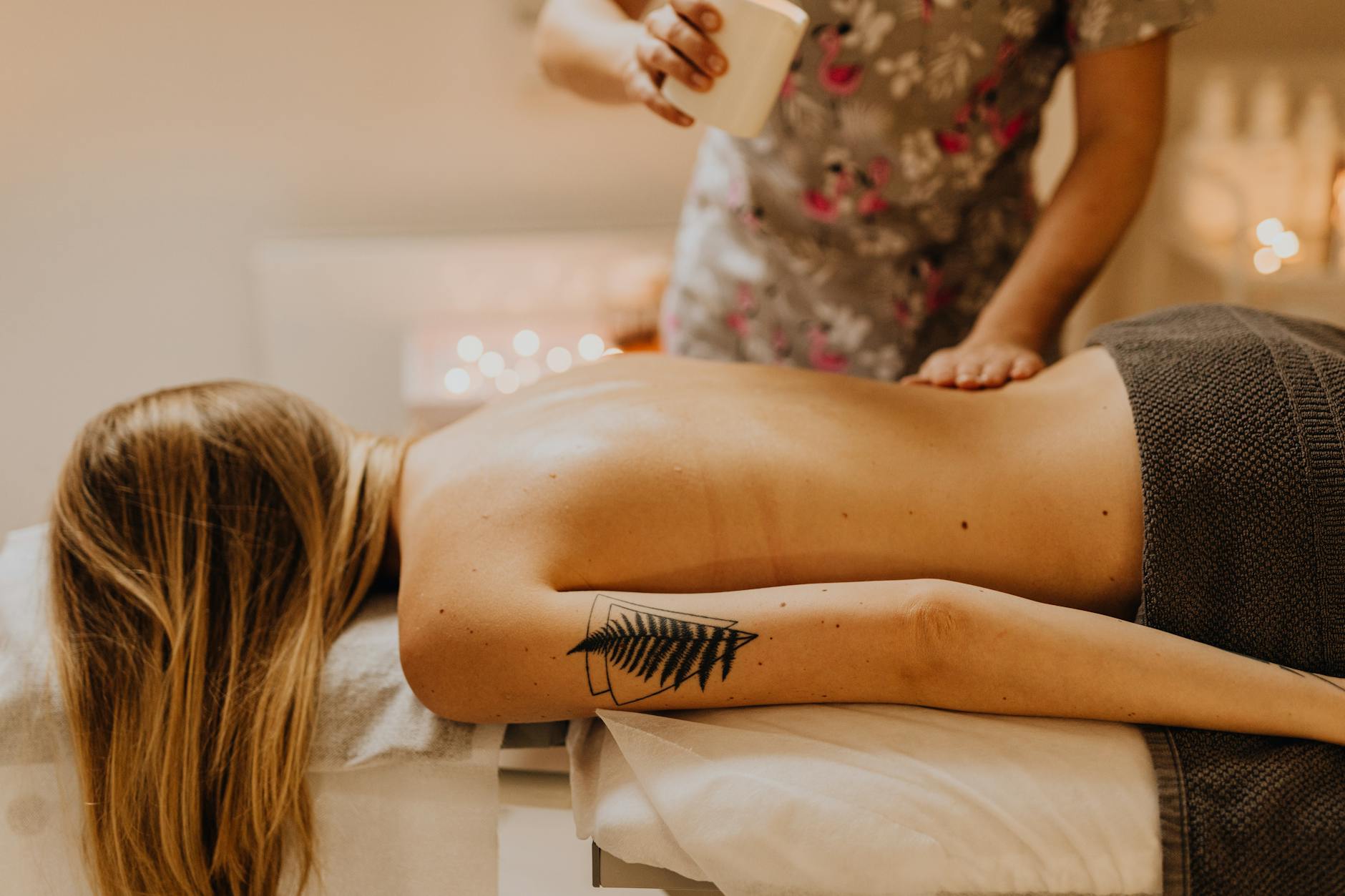 Peaceful spa treatment room with natural lighting and wellness amenities in tropical setting