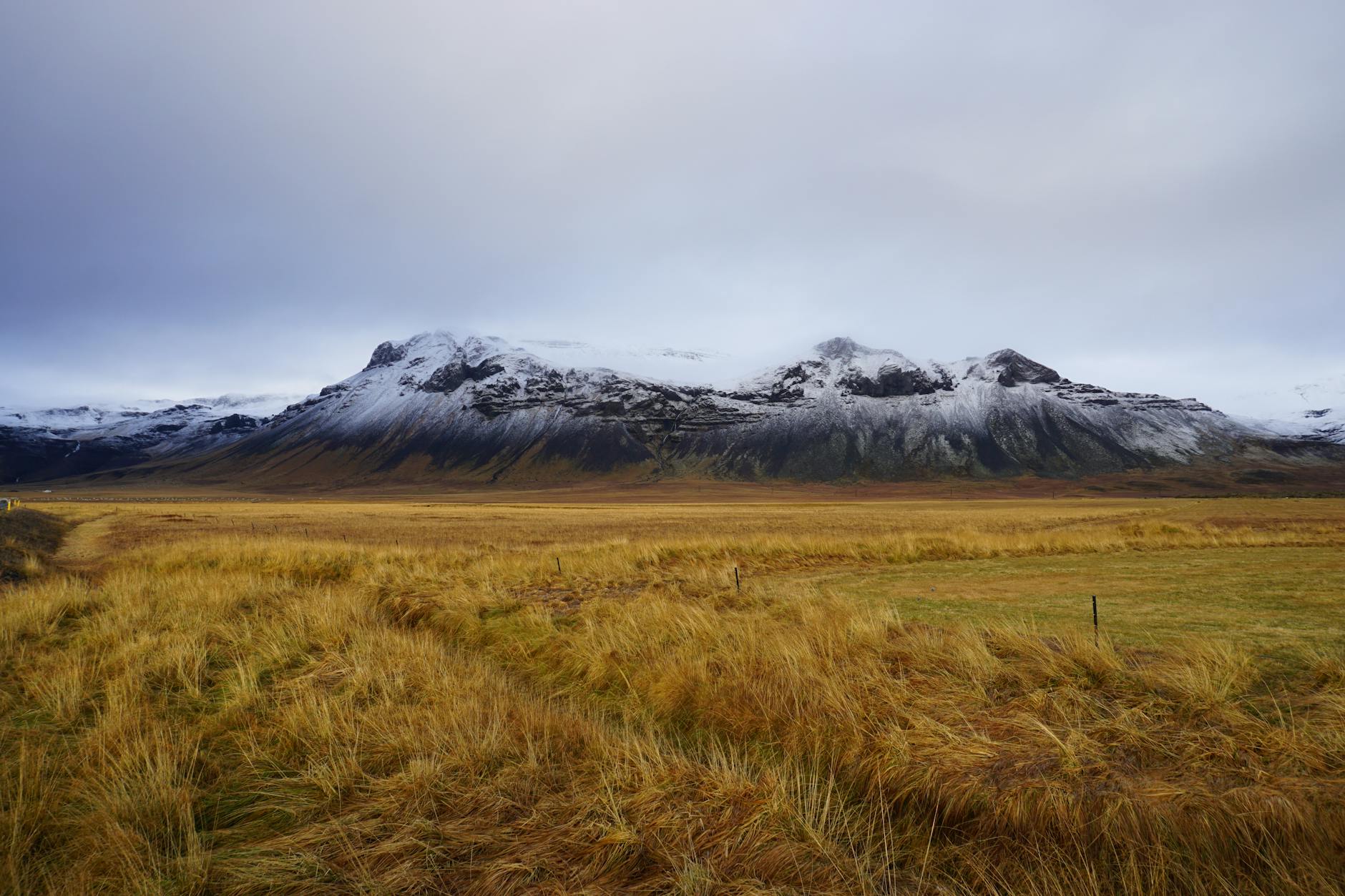 Snow-covered Icelandic landscape with volcanic rock formations