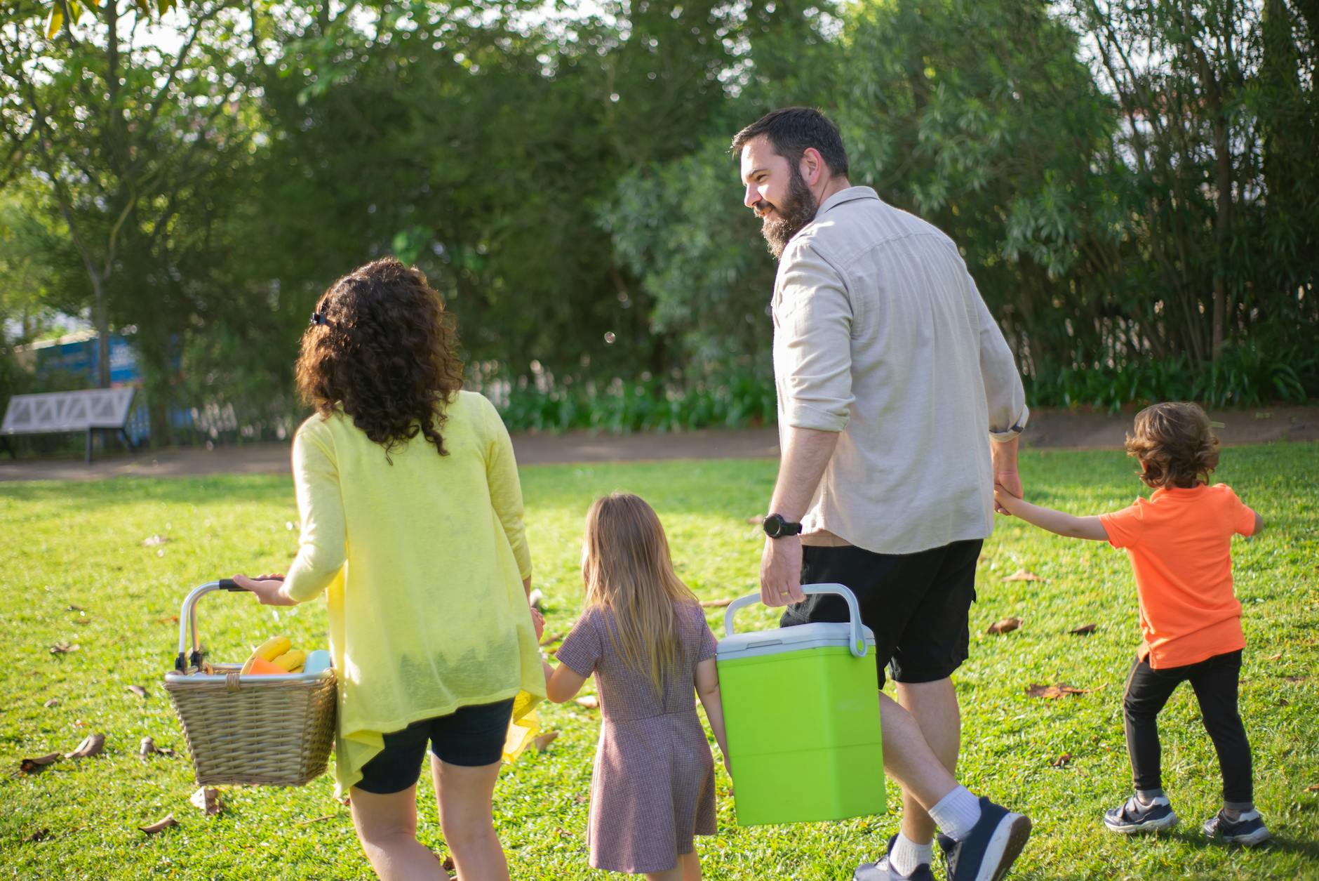 Parents and children engaging in outdoor activities together without digital devices