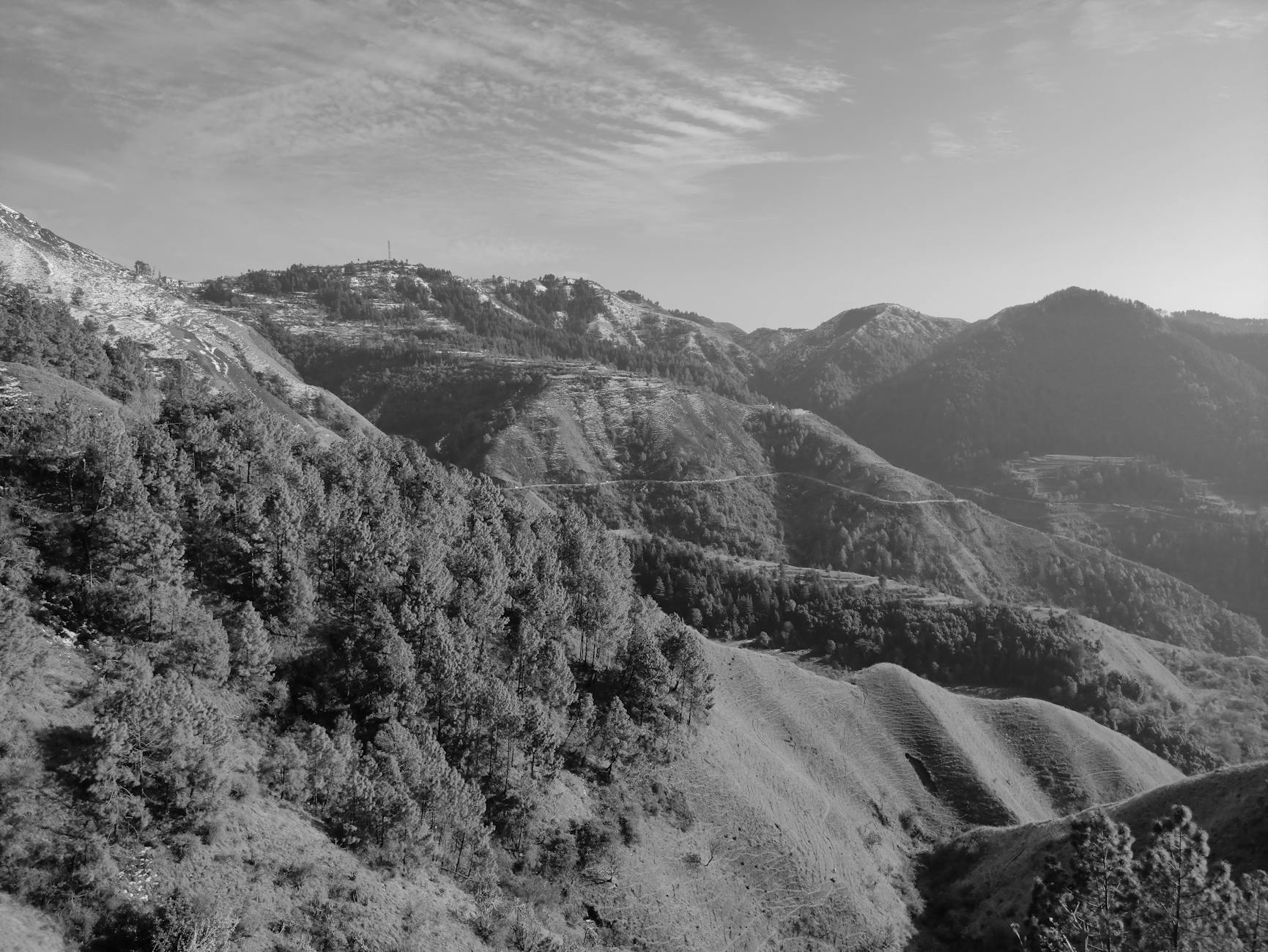 Dramatic mountain landscape with deep valleys and rugged terrain typical of New Zealand's South Island