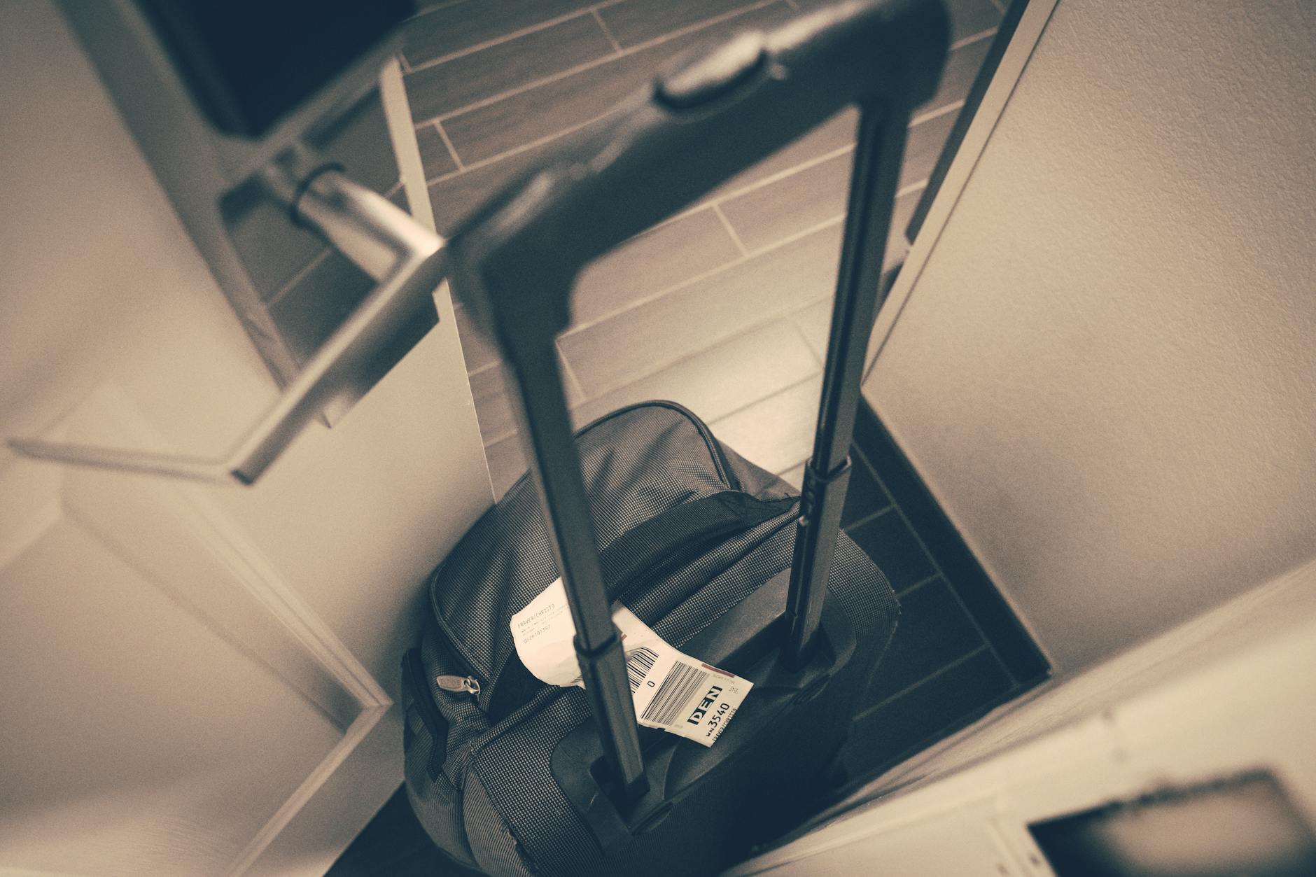 Traveler with luggage at airport terminal preparing for content creation trip