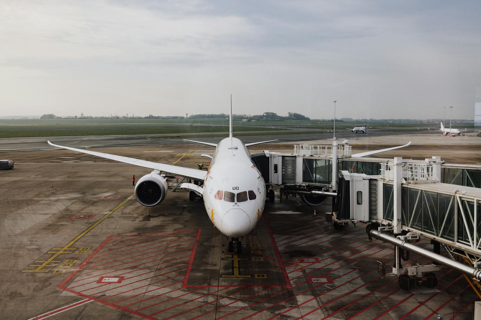 Passengers boarding commercial aircraft with carry-on luggage