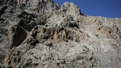 Dramatic cliff escarpment in the Simien Mountains of Ethiopia under a clear sky