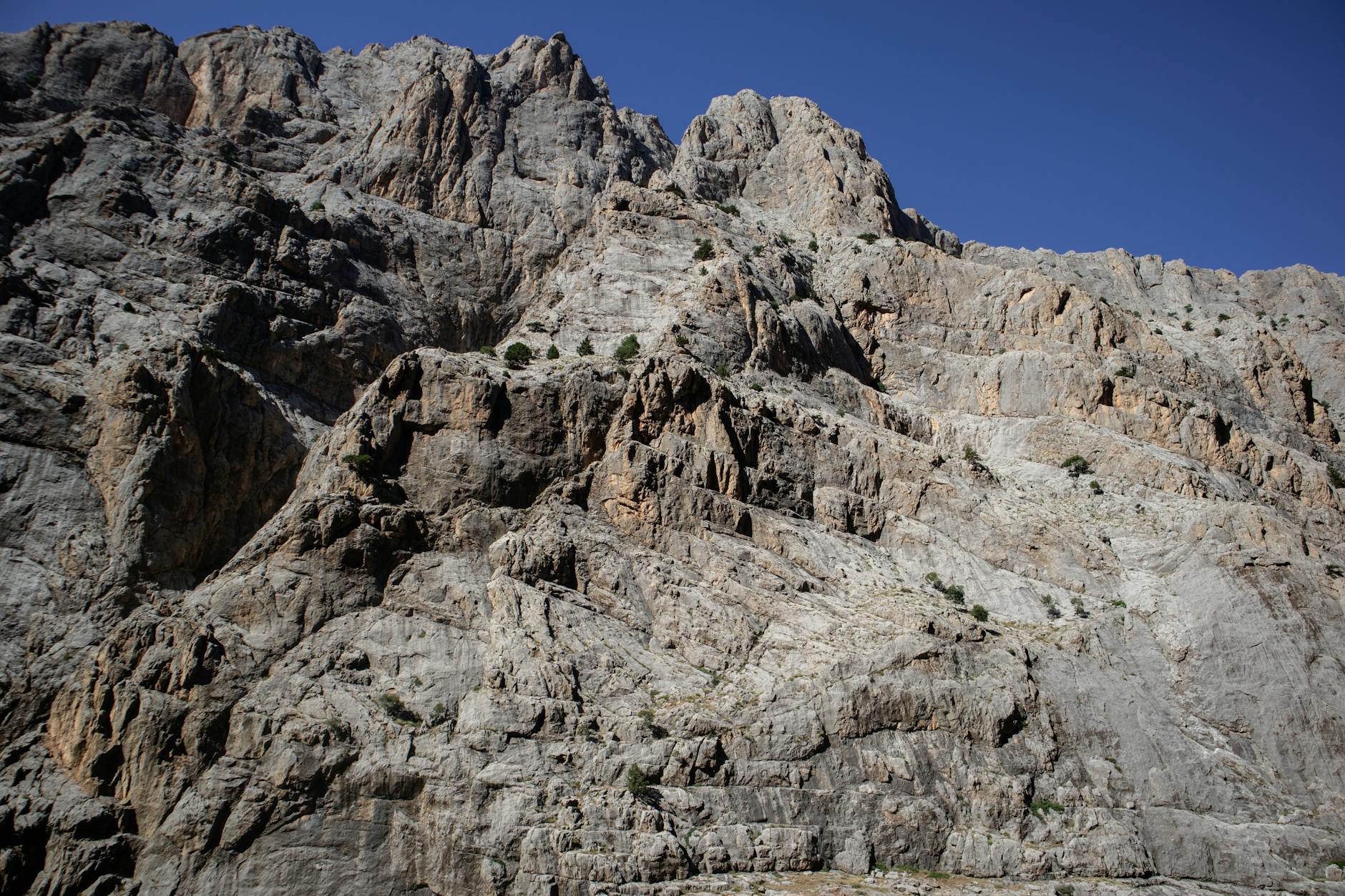 Dramatic cliff escarpment in the Simien Mountains of Ethiopia under a clear sky