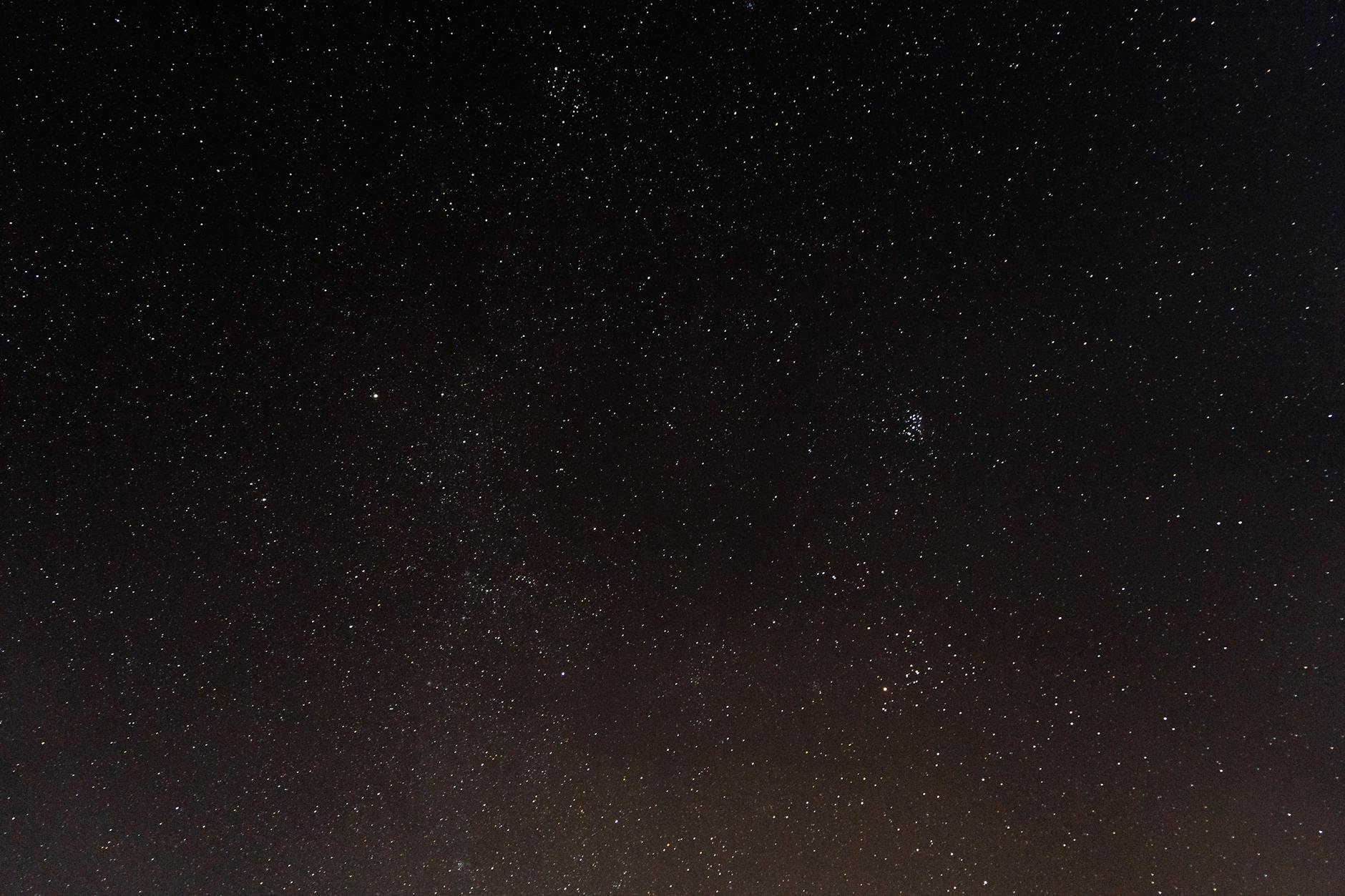 Milky Way visible over a dark rural landscape with no light pollution