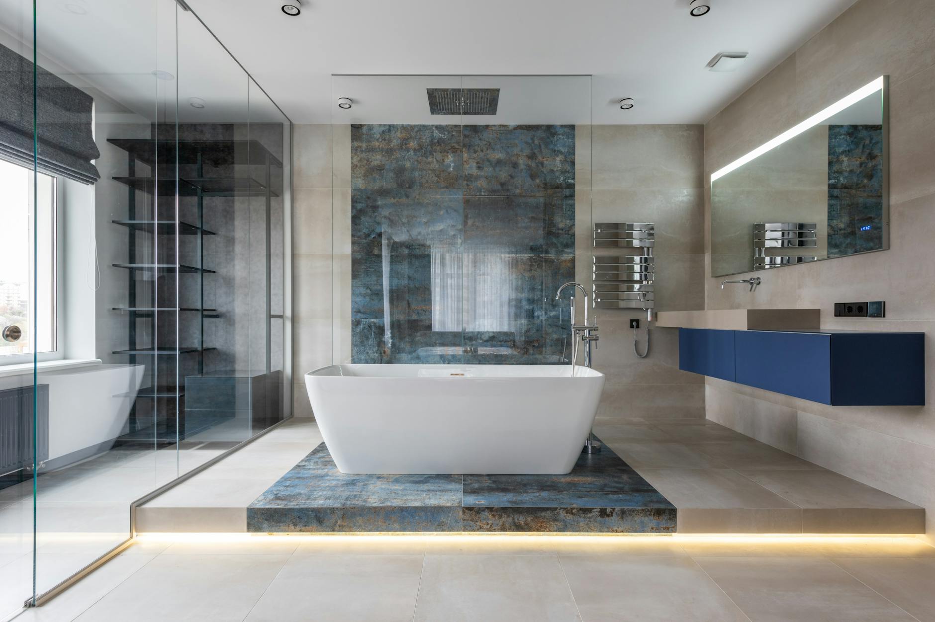 Modern hotel bathroom featuring large soaking tub