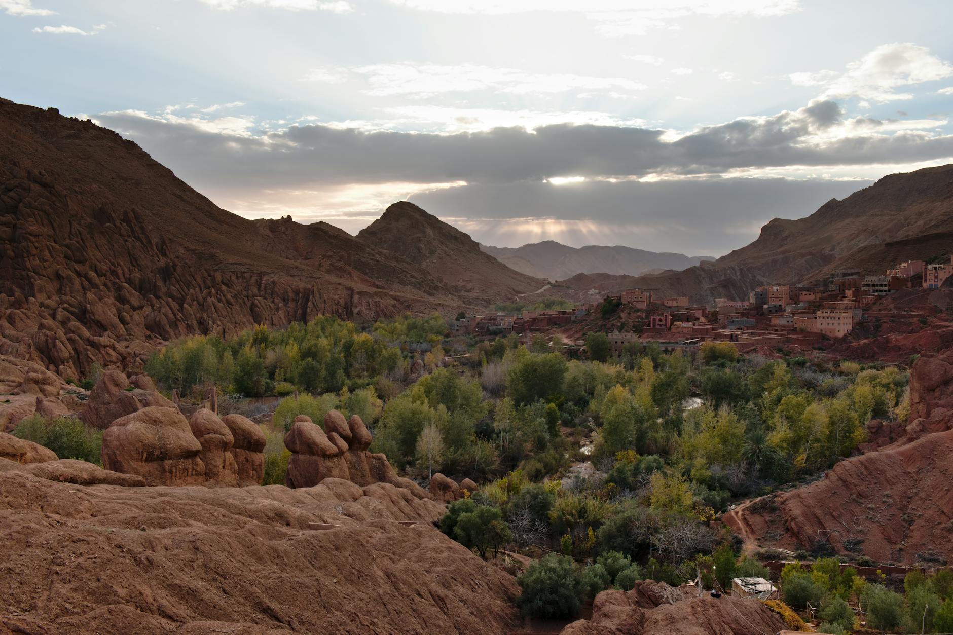 Narrow limestone canyon walls of Todra Gorge rising steeply above the canyon floor in Morocco