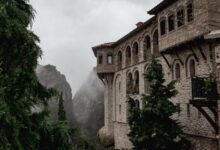 Ancient monasteries perched on tall sandstone rock pillars at Meteora, Greece
