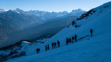 A narrow trekking trail winding through high-altitude Himalayan mountain terrain in Nepal