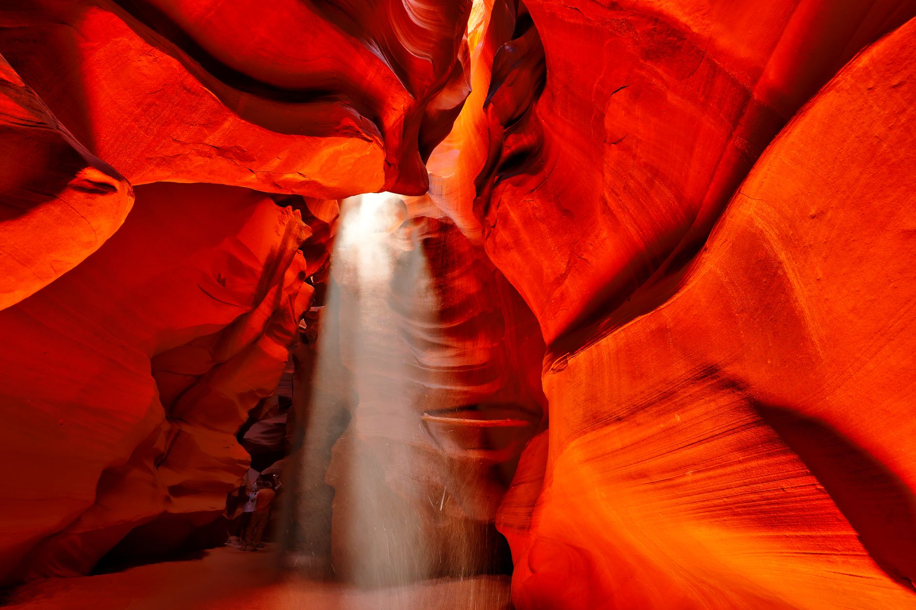 Rugged sandstone canyon formations rising from dry savanna landscape in Madagascar's Isalo National Park