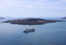 Aerial view of a volcanic island rising from a large freshwater lake