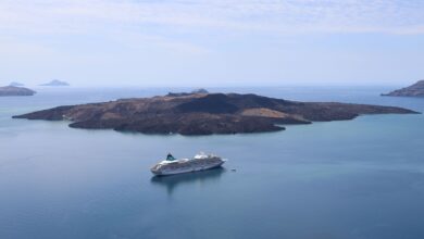 Aerial view of a volcanic island rising from a large freshwater lake