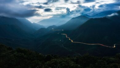 Winding mountain road through karst limestone landscape in northern Vietnam