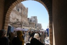 Whitewashed walls and blue doorways in a traditional North African medina