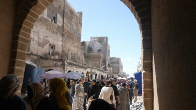 Whitewashed walls and blue doorways in a traditional North African medina