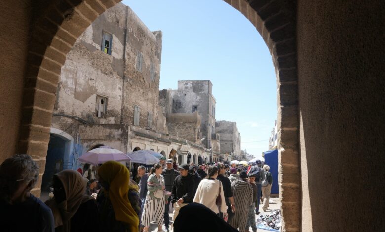 Whitewashed walls and blue doorways in a traditional North African medina